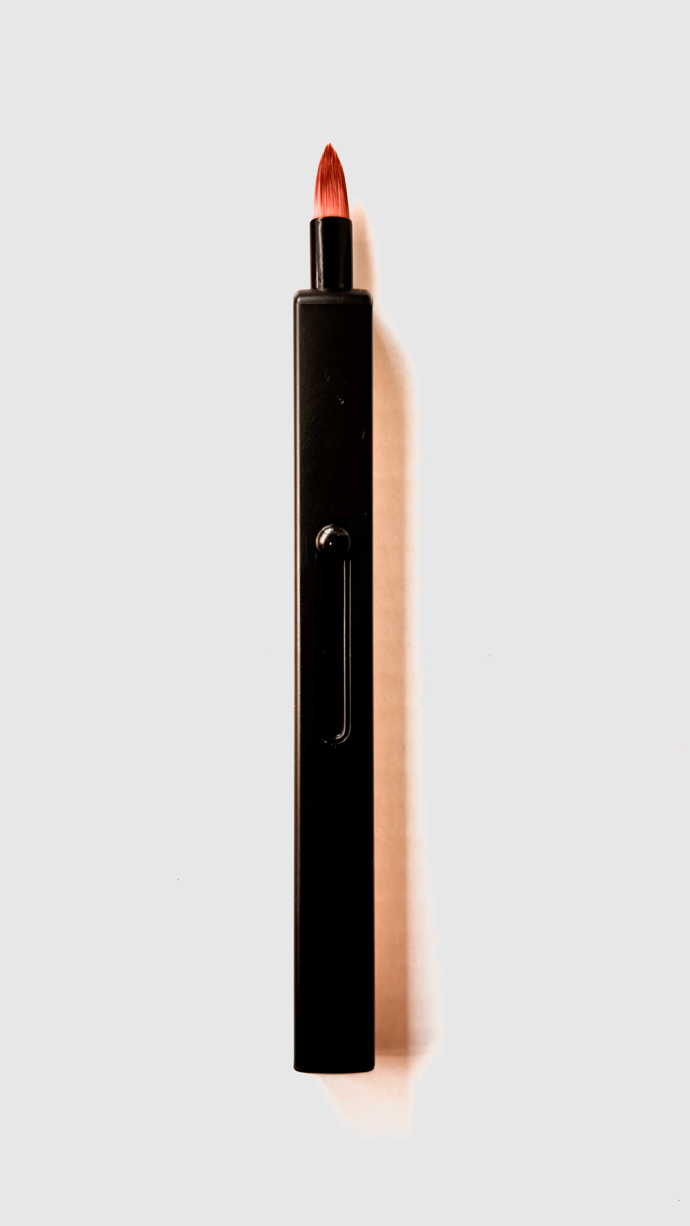 Black Retractable lip brush